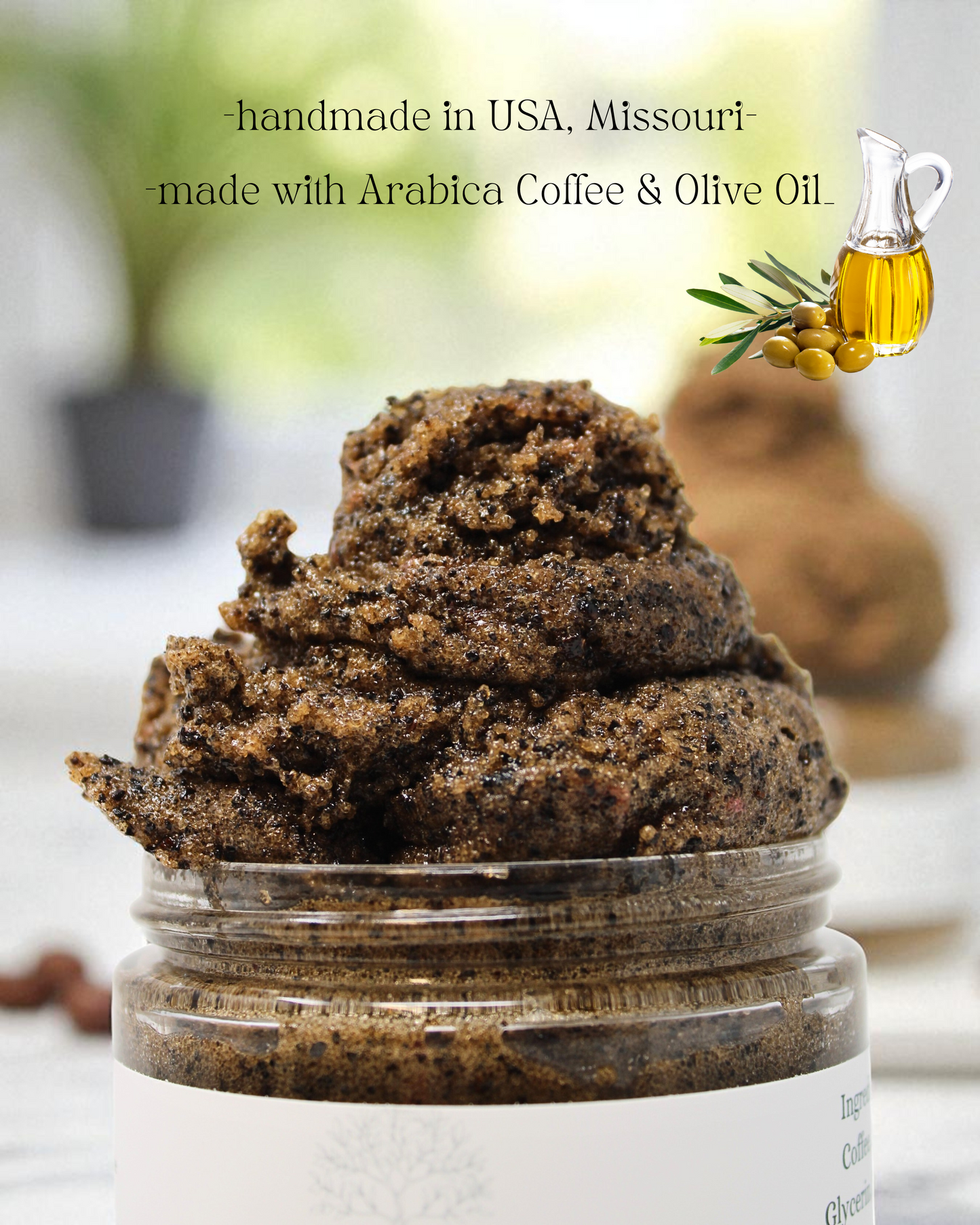 the top of the jar that is filled with coffee and sugar scrub saying "handmade in USA, Missouri, made with arabica coffee and olive oil"