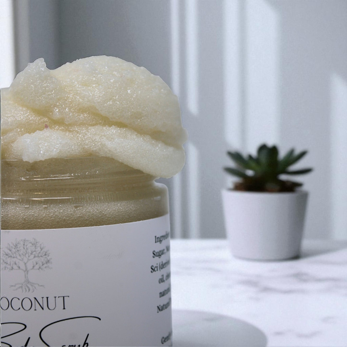 Jar of coconut body butter with a plant in the background