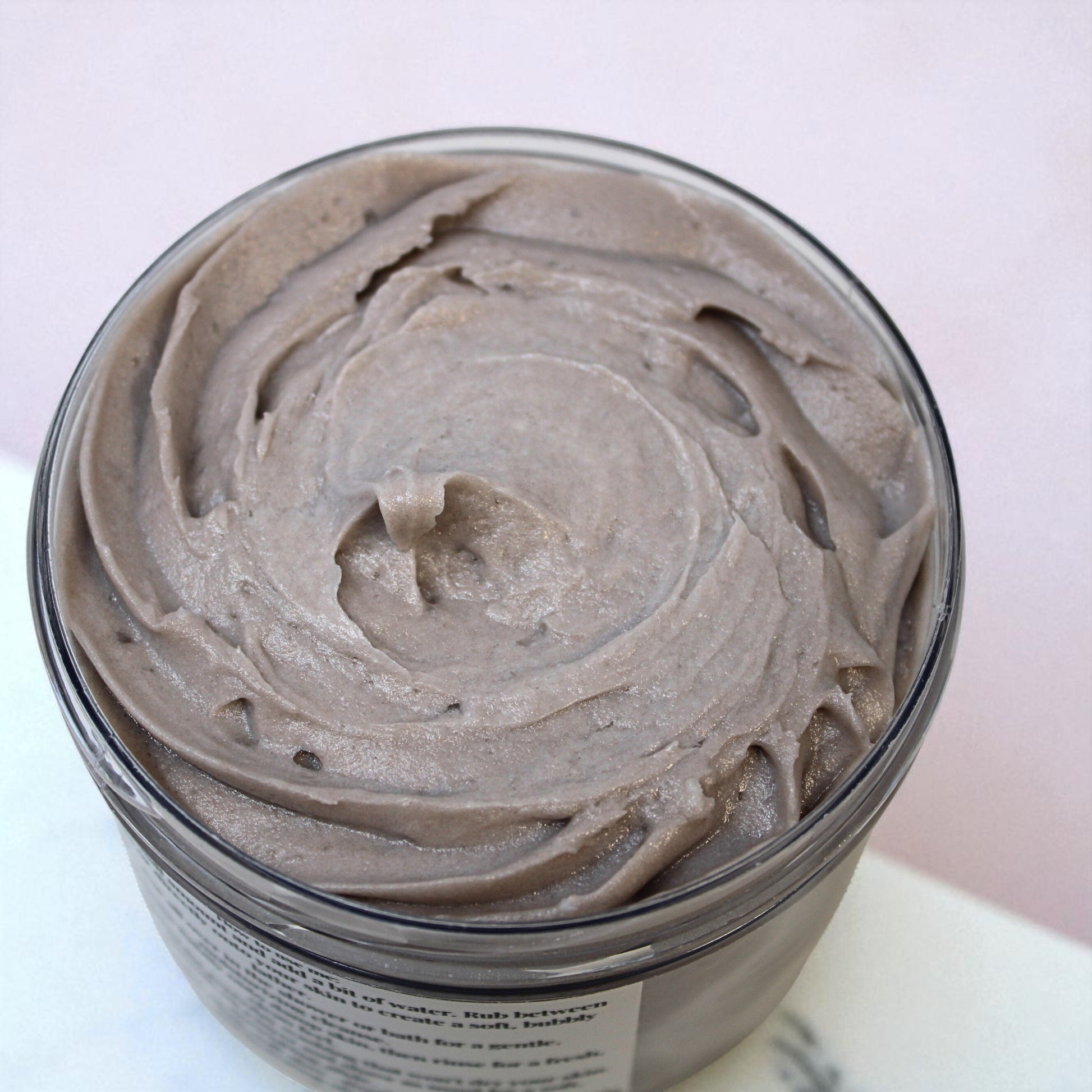 a jar of whipped soap made with olive oil, great for hair, body and as shaving cream